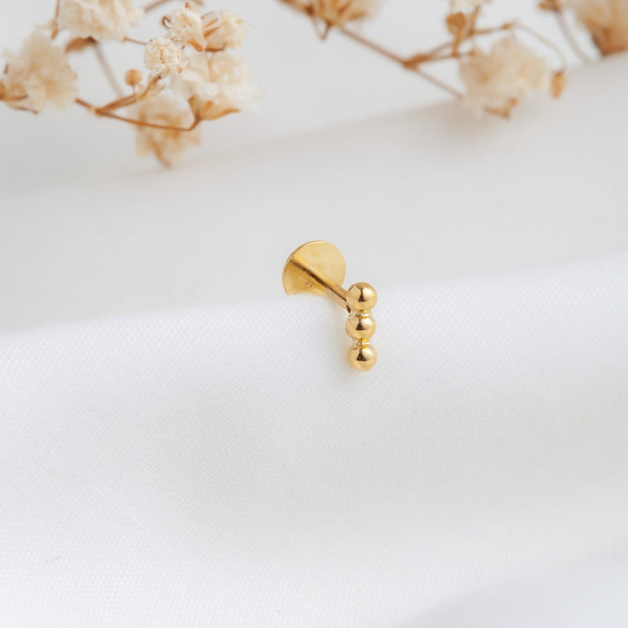 Piercing Tres bolitas