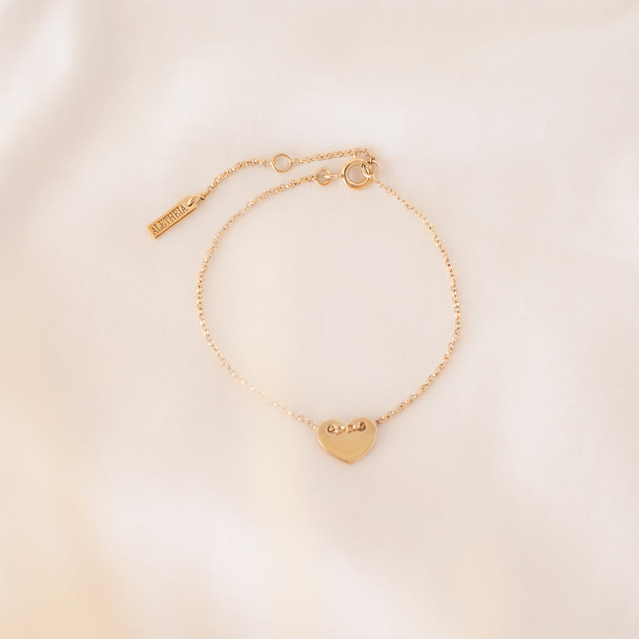 Pulsera Corazón botón